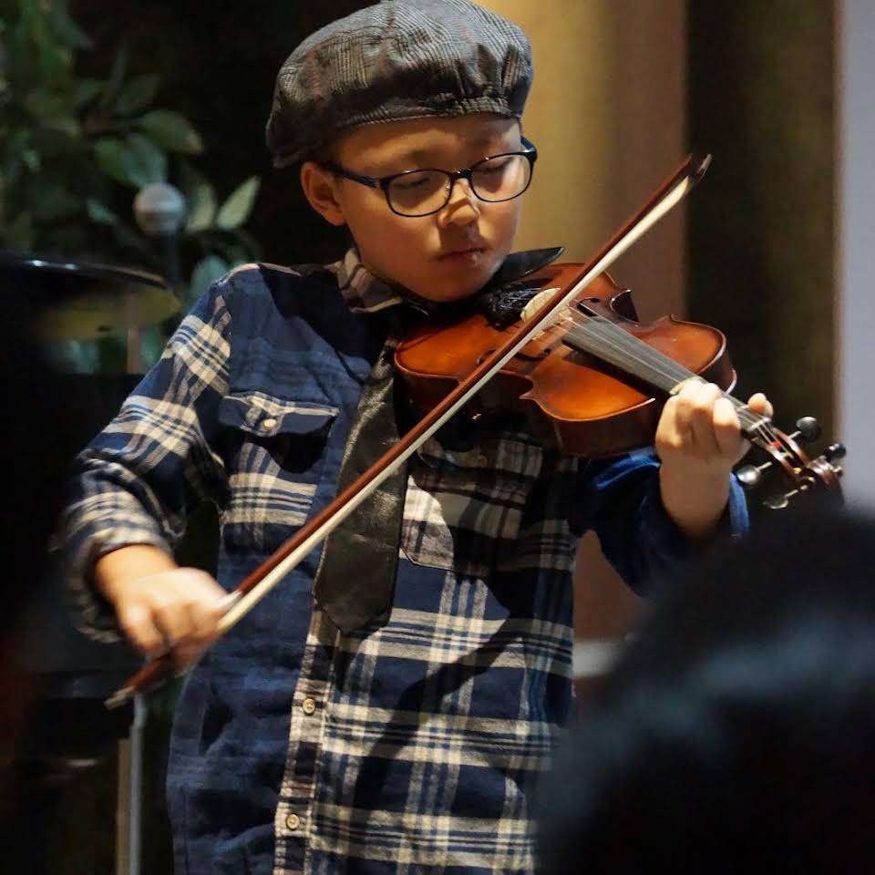 student playing violin