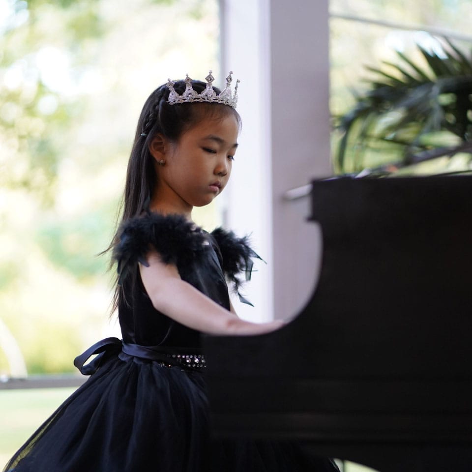 student playing piano